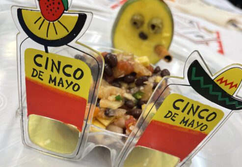 A Cinco de Mayo-themed dish with a creative presentation featuring glasses decorated with fruit and a playful garnish, showcasing the fun and festive atmosphere of the Salsa Showdown team building event.